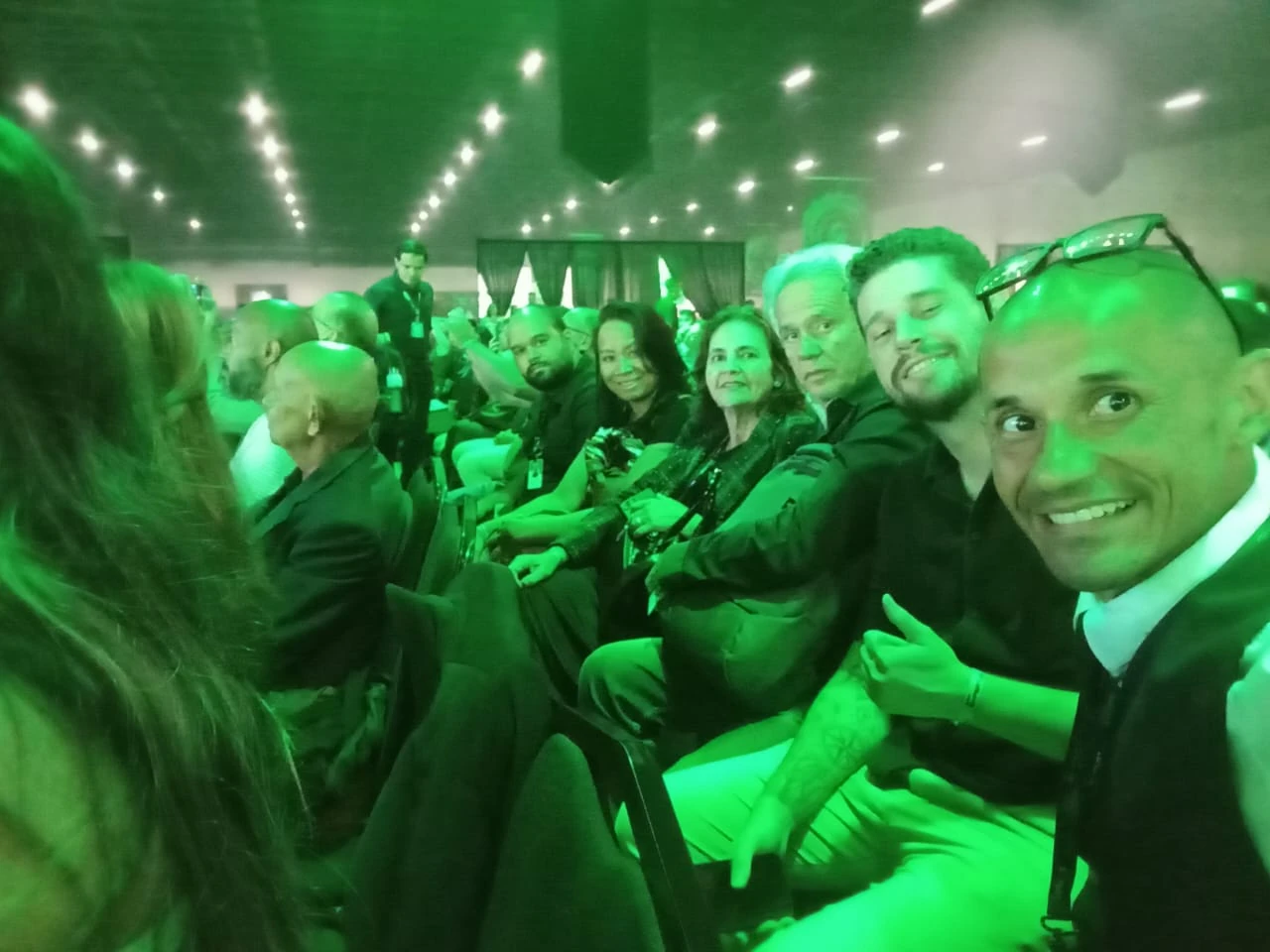 Marcelo participando de um evento com outros participantes